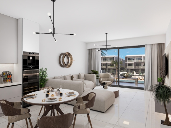 kıbrıs Dört kişilik yuvarlak masa, bej kesitli kanepe ve havuz manzaralı bir balkona bakan geniş pencerelere sahip modern bir açık plan oturma ve yemek alanı, Kuzey Kıbrıs gayrimenkulde İskele Long Beach satılık daire arayanlar için idealdir. aysan_giti